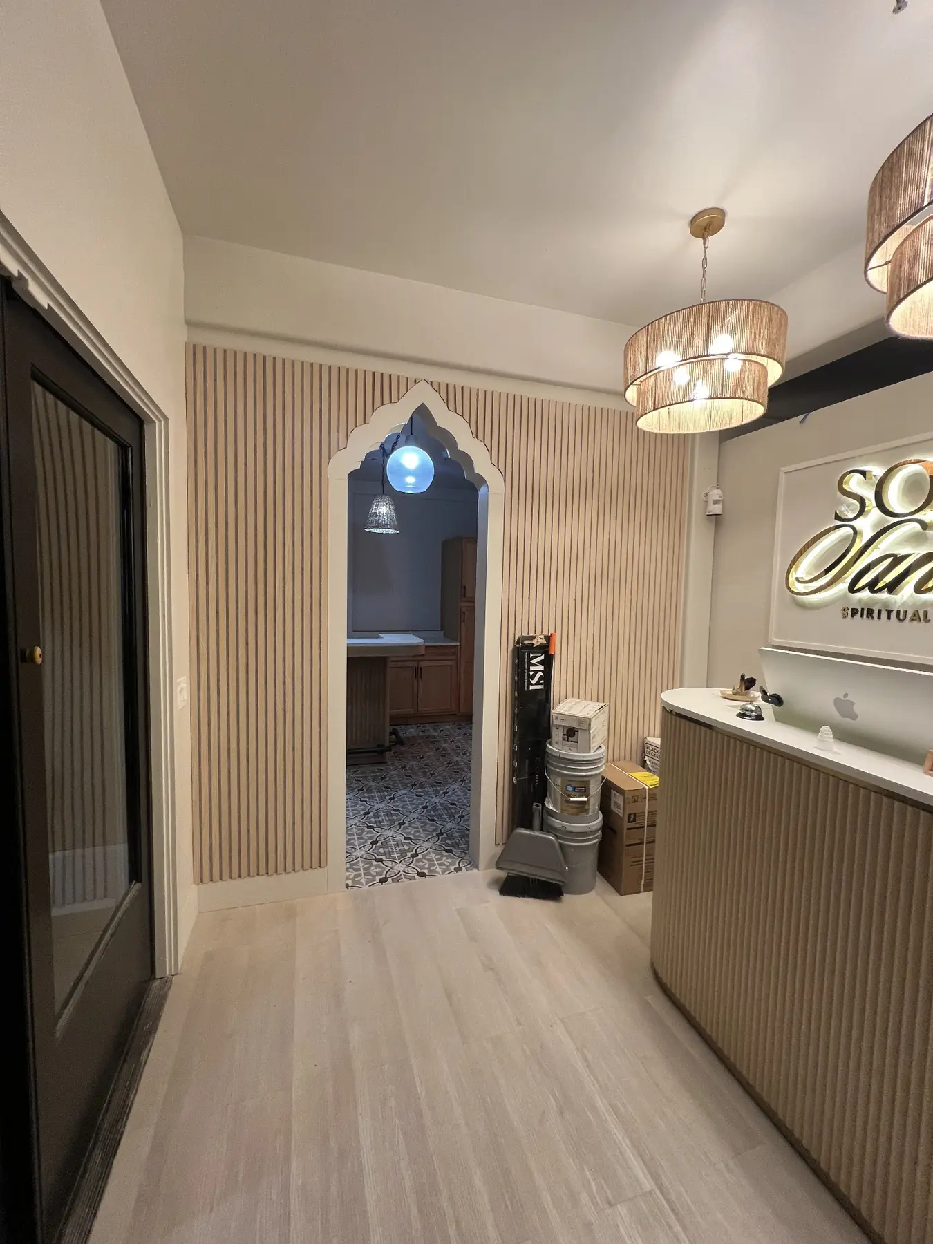 Custom doorway and reception area at Source Sanctuary